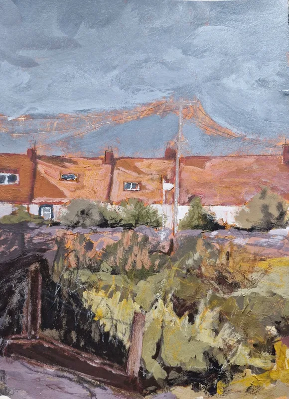 A row of cottages with red pantile roofs behind a garden of green and yellow plants, telegraph wires above
